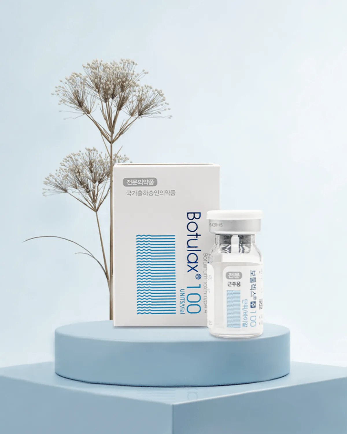 Botulax 100 unit carton and vial on a pale blue pedestal